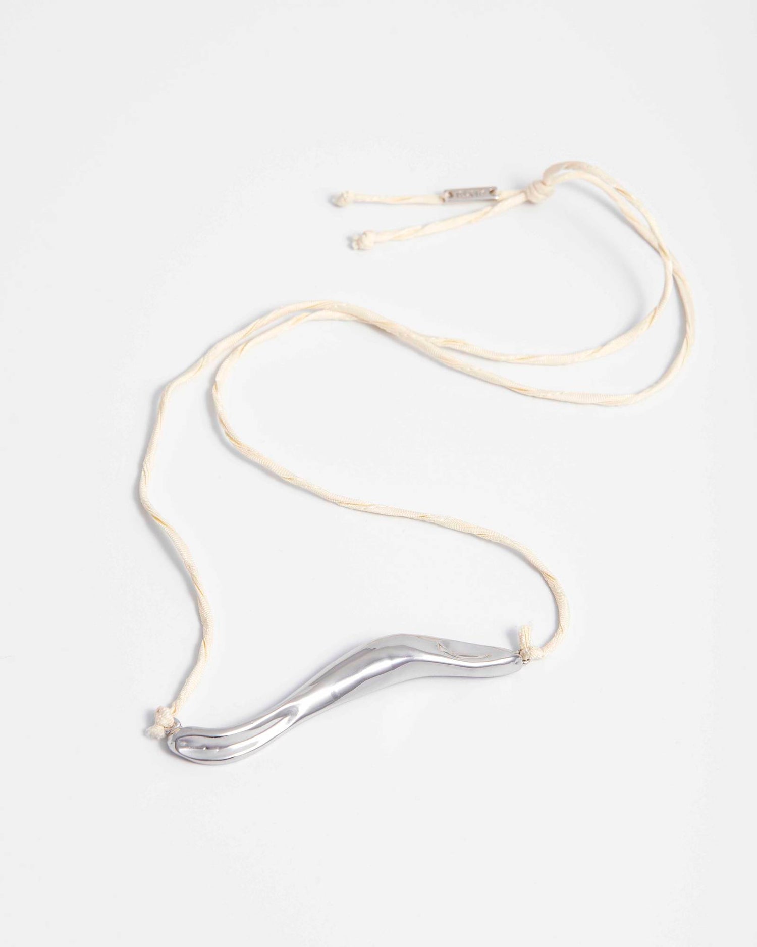 NECKLACE WITH IRREGULAR ELEMENT