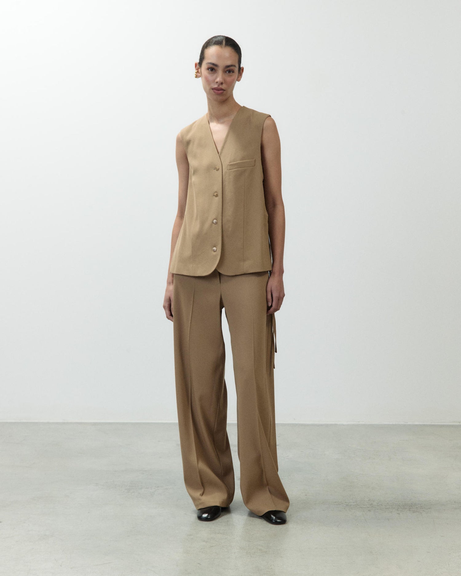 GILET IN LANA CON SPACCHI LATERALI