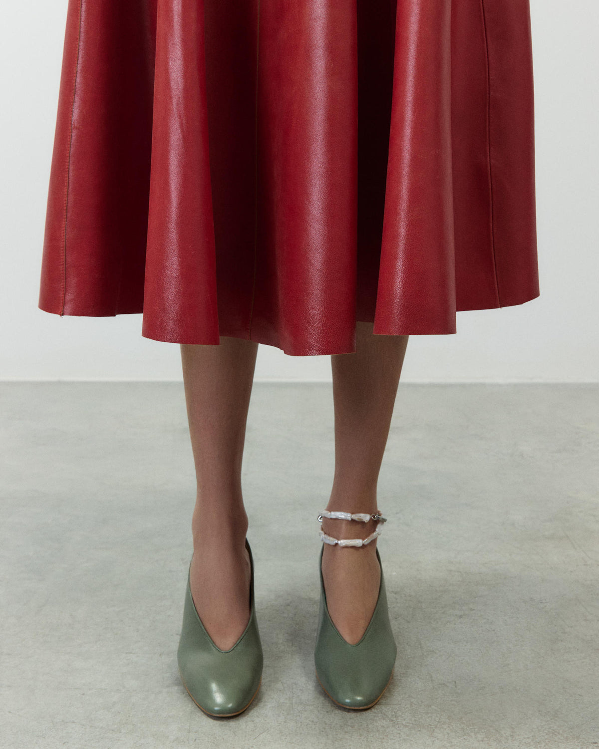 MIDI LEATHER FLARED SKIRT