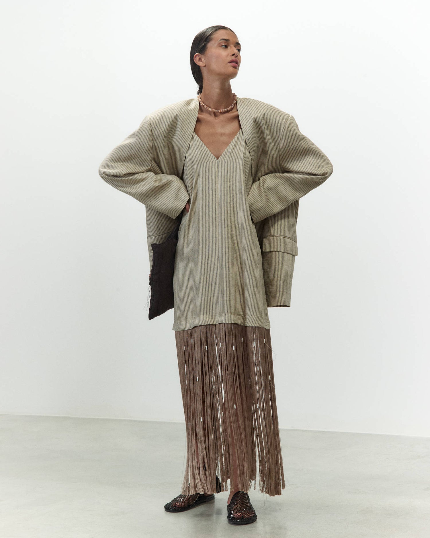 ABITO LUNGO CON FRANGE