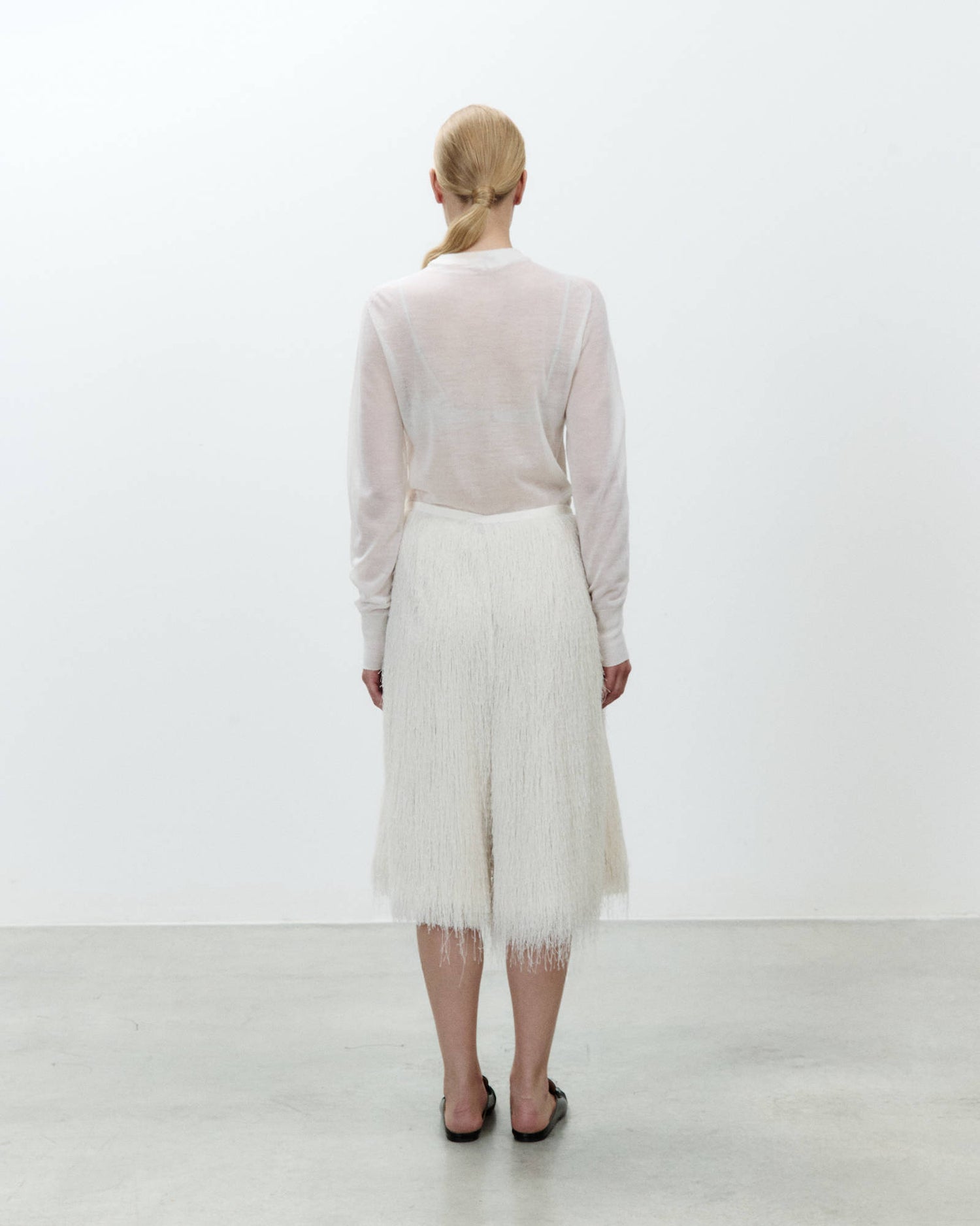BERMUDA SHORTS WITH FRINGES