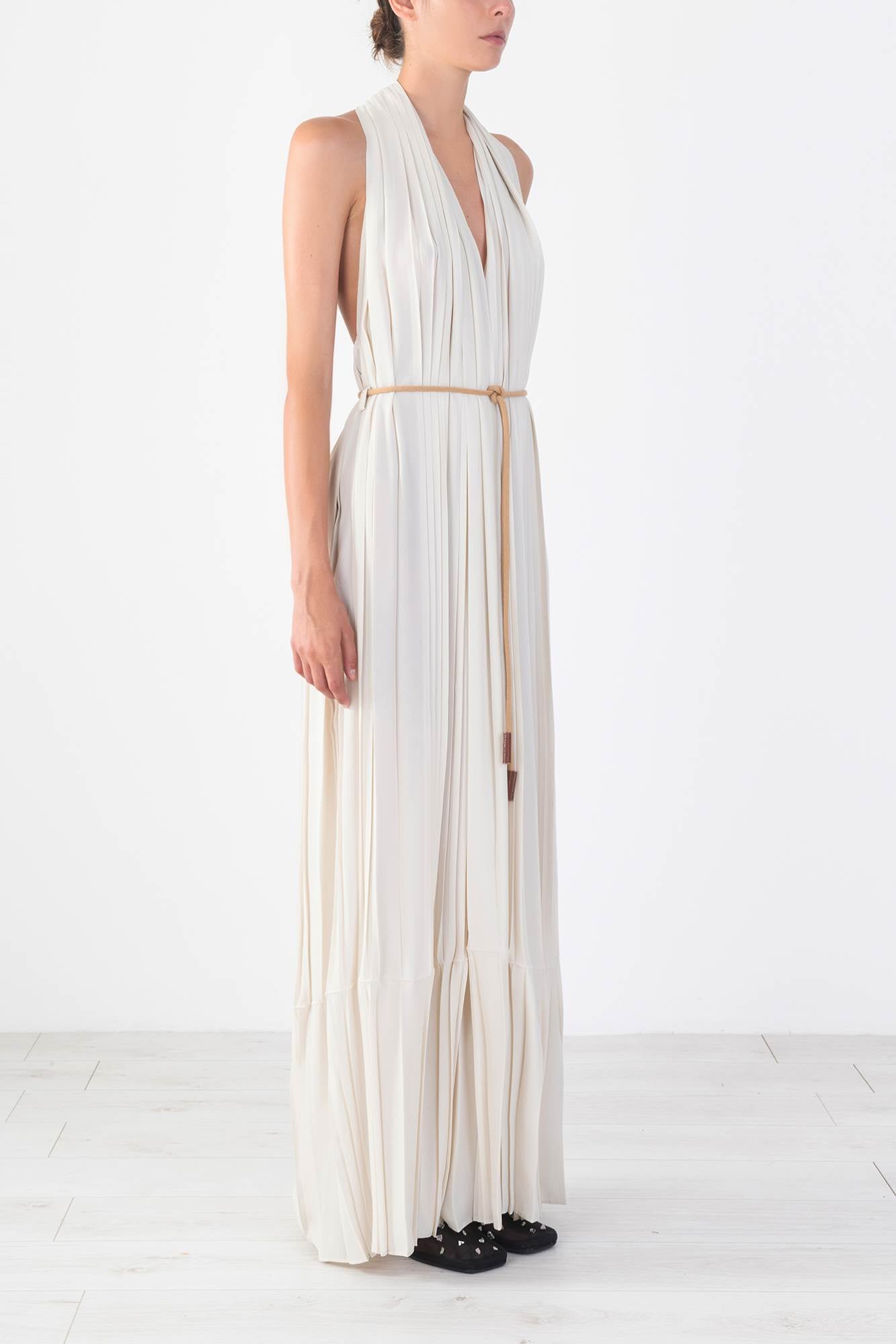 LARGE PLEATED DRESS WITH WEAVED DETAIL
