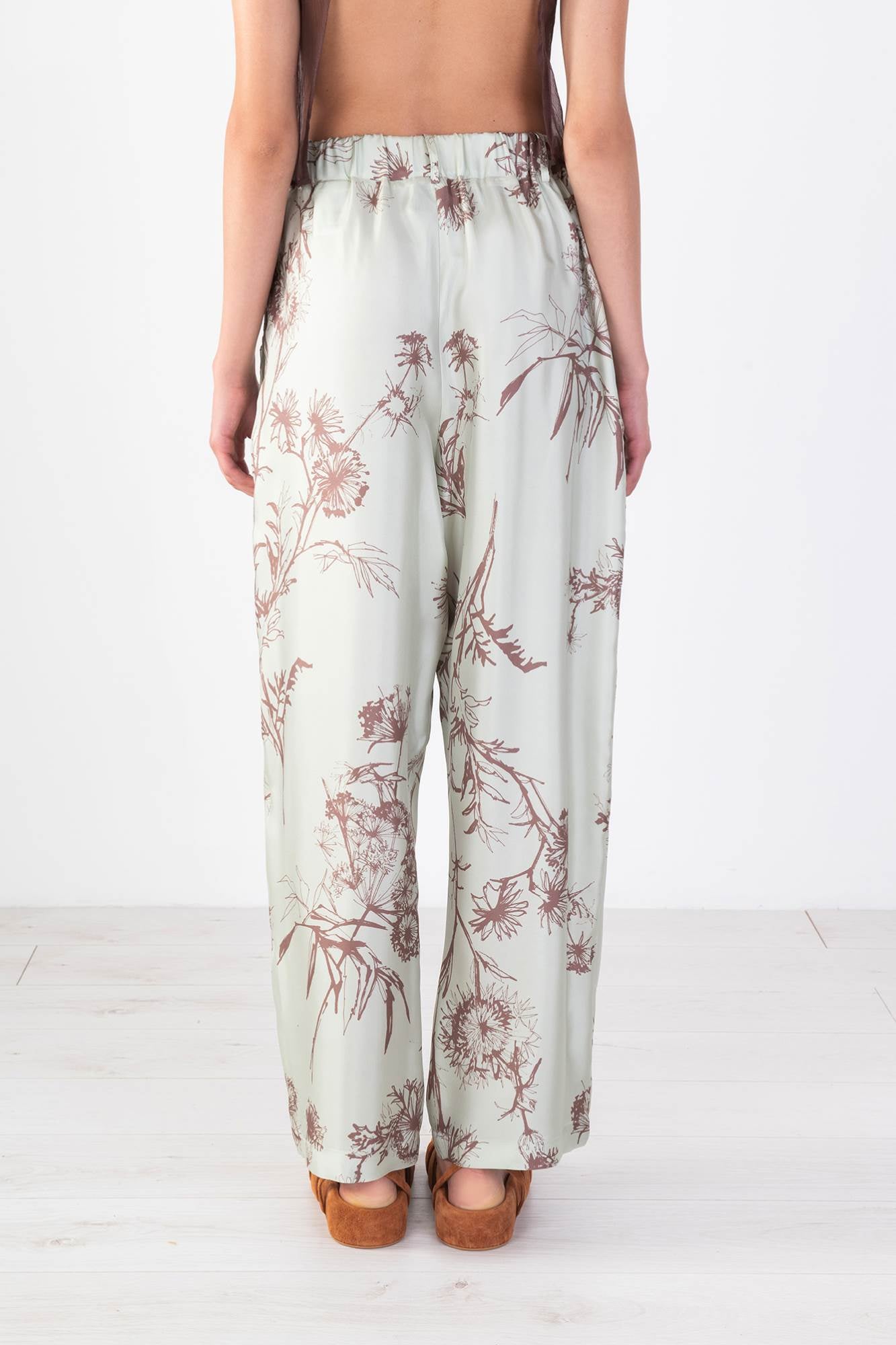 DOUBLE PENCE TROUSERS WITH “DANDY LION” PRINT
