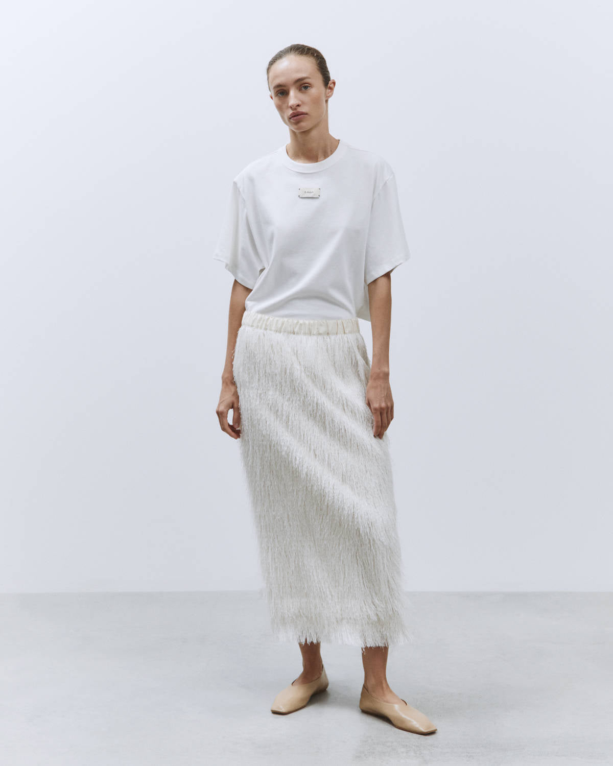 MIDI SKIRT IN FRINGED FABRIC