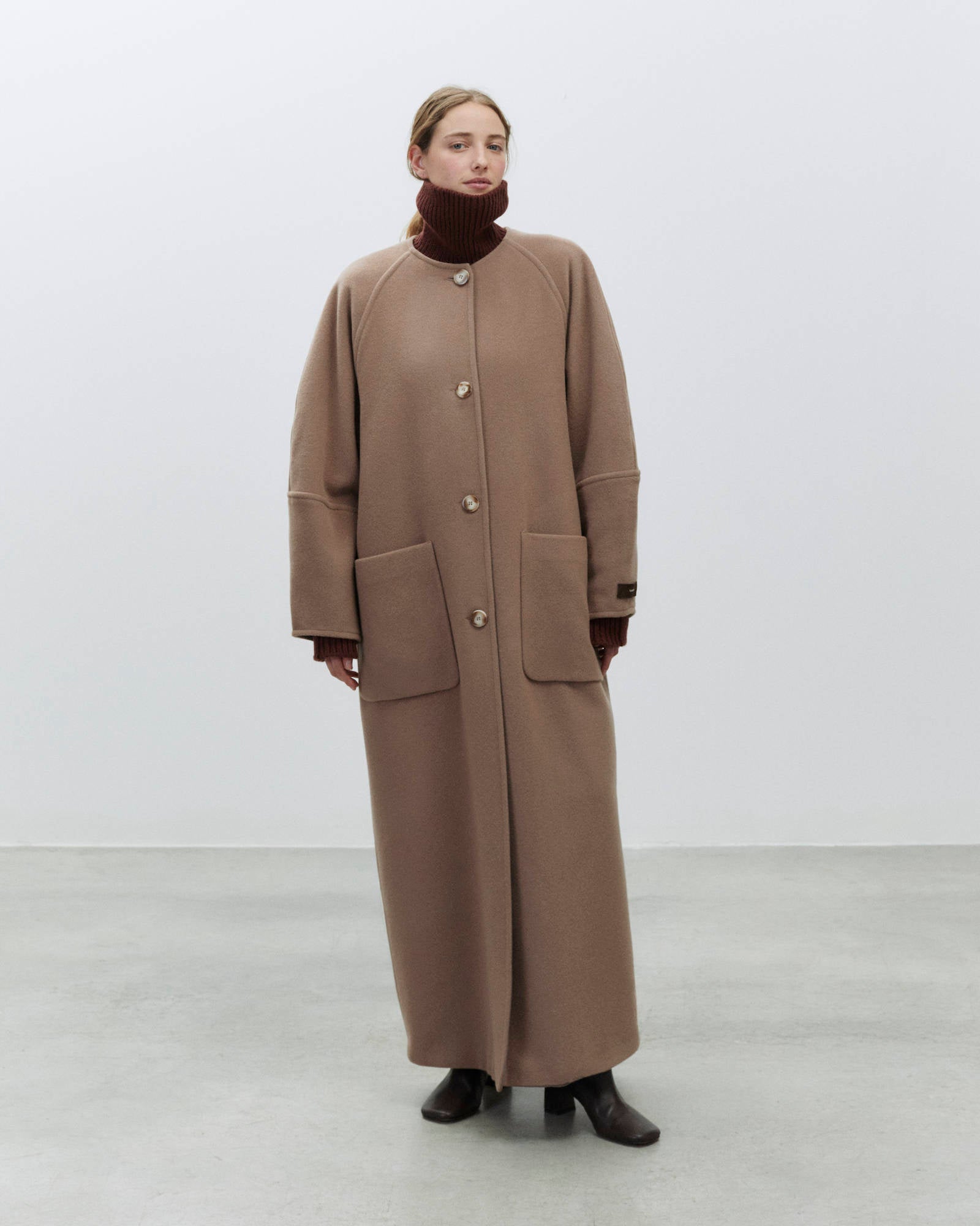 OVER COAT SYMPOSIUM
